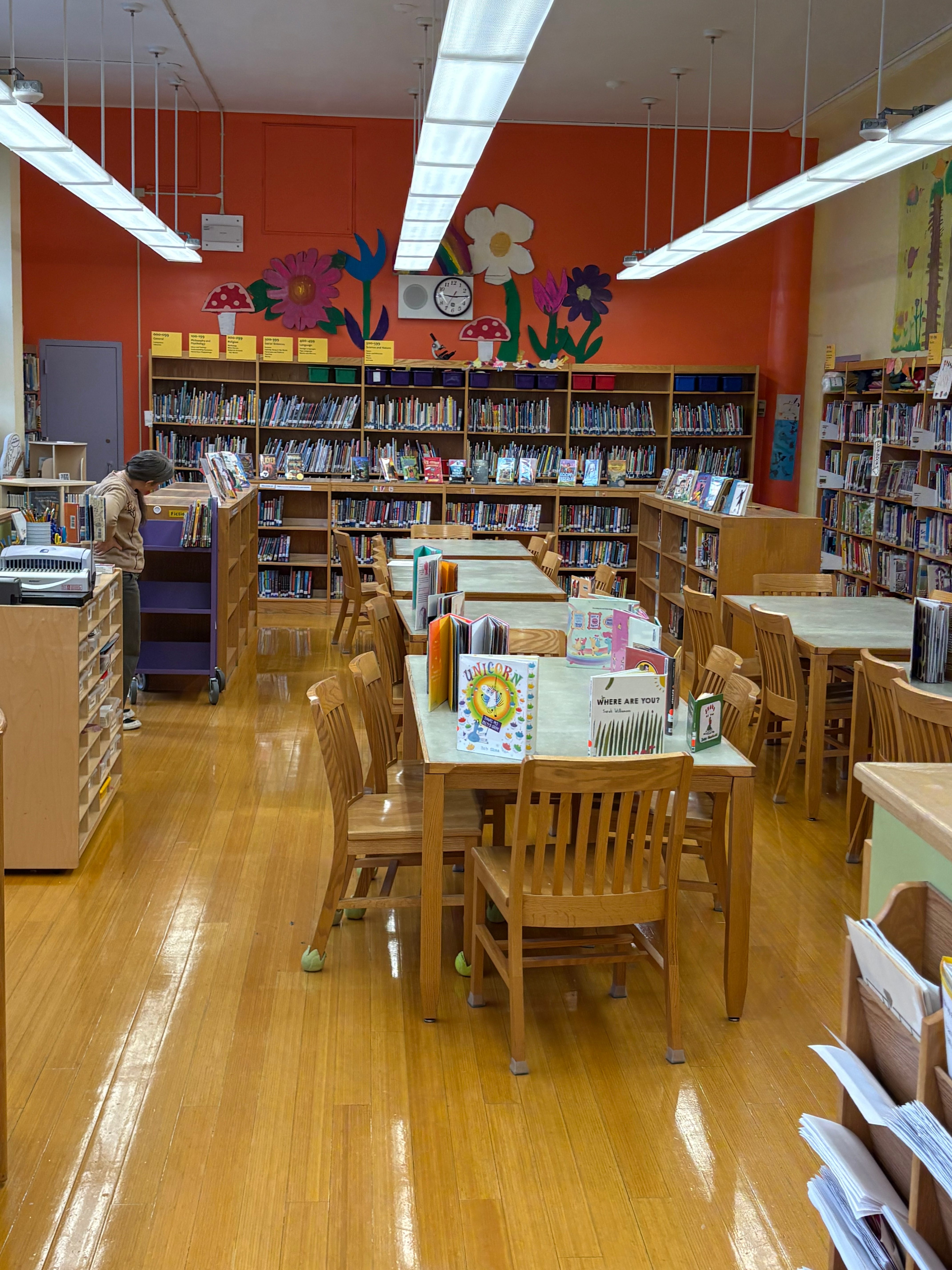 Parent volunteer in the library