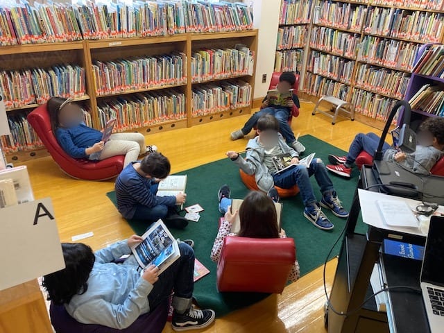 Students reading in the library